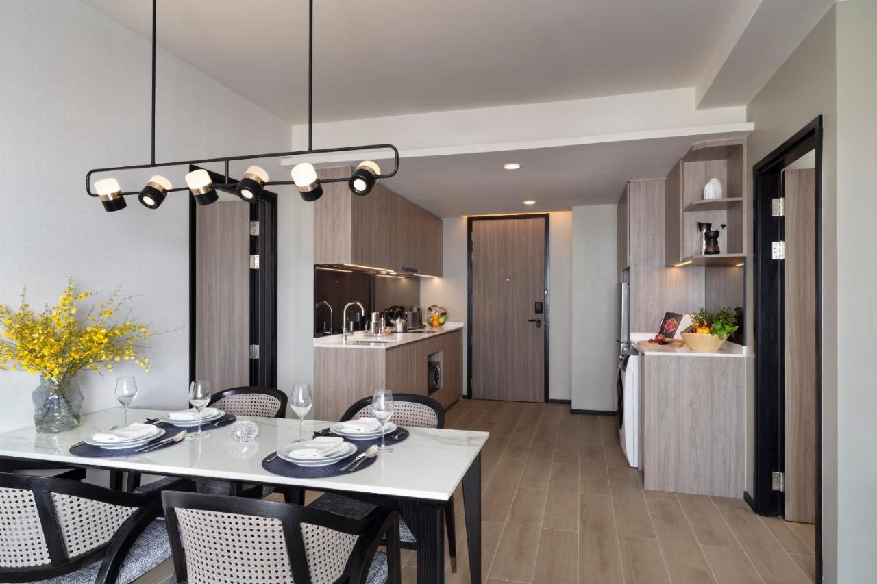 Somerset Pattaya Exteriör bild The kitchen and dining area of a typical apartment